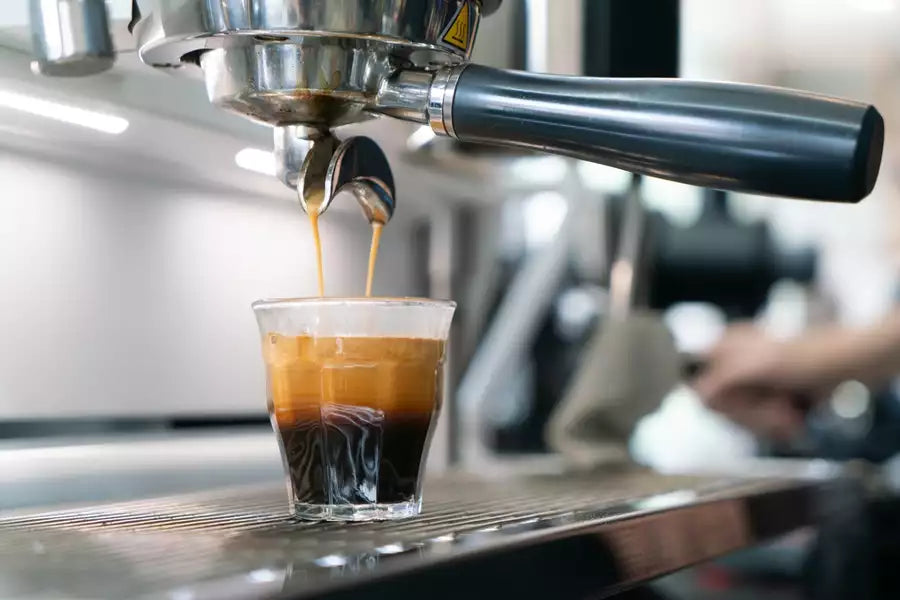 Espresso being made in an espresso machine.