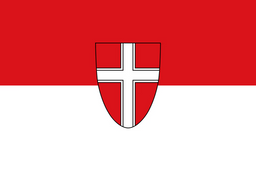 Flag with a red background and a white cross and shield emblem