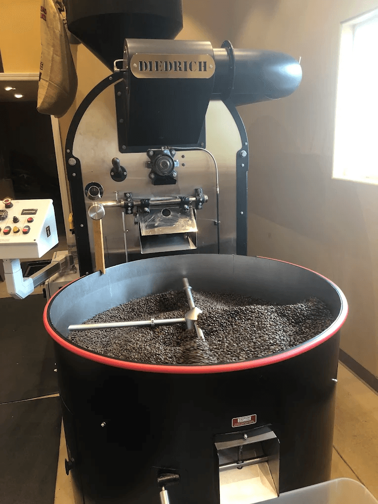 Diedrich coffee roaster machine in a coffee shop setting