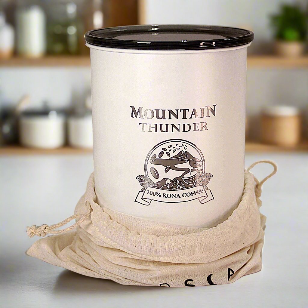 matte white enameled airsccape canister with laser etched mountain thunder logo partially in cloth bag