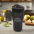 matte black logo tumbler from front with lid