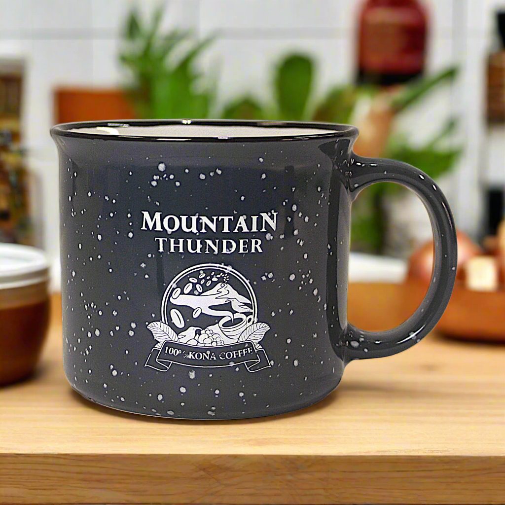 ceramic dark grey campfire style mug with white interior, black lip and mountain thunder logo