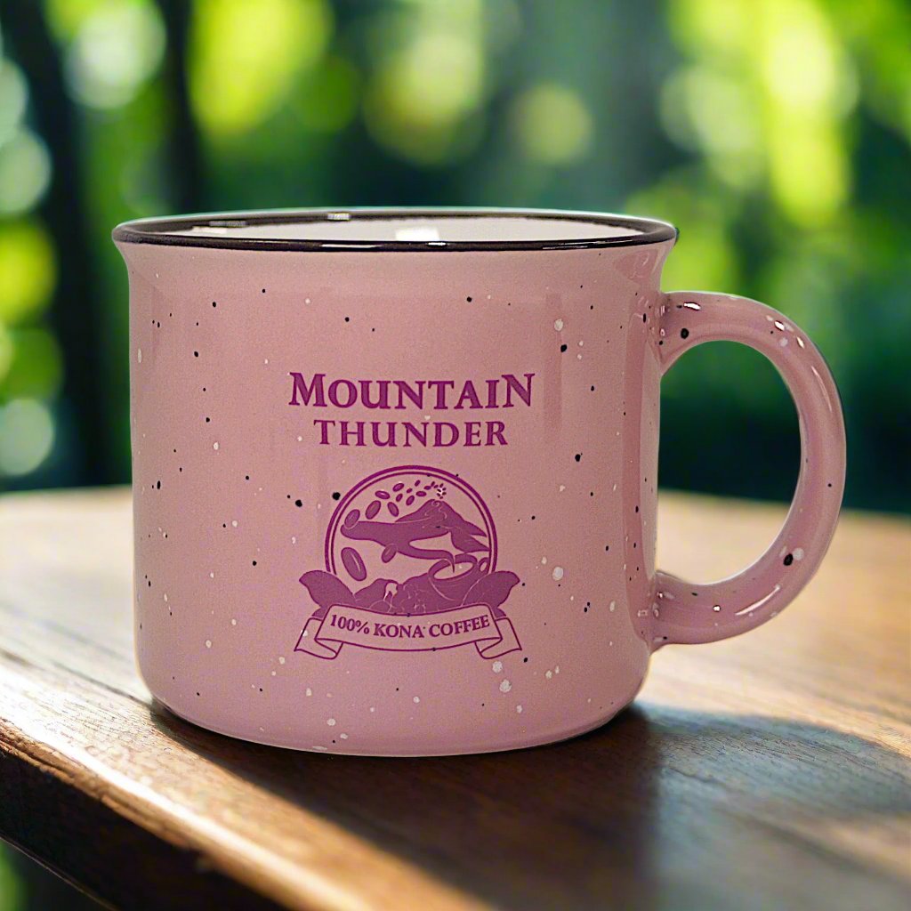 pink ceramic campfire style mug with black and white speckles, white interior, black rim and pink mountain thunder logo