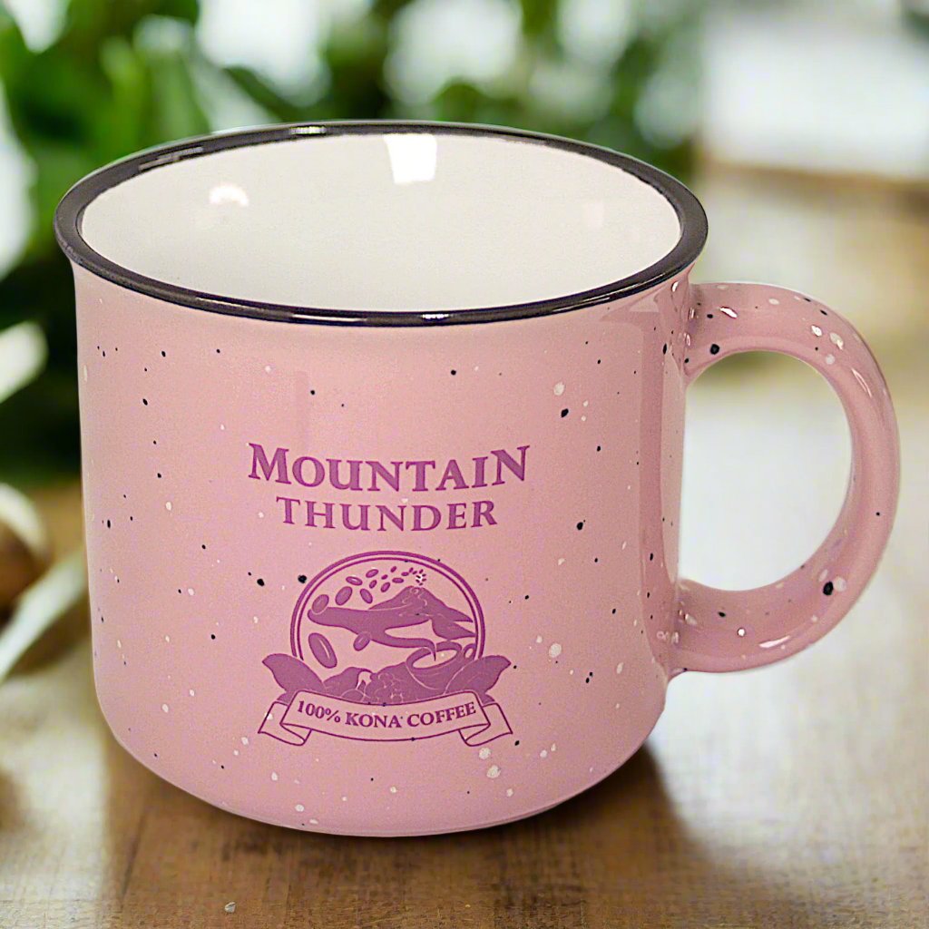 pink ceramic campfire style mug with black and white speckles, white interior, black rim and pink mountain thunder logo