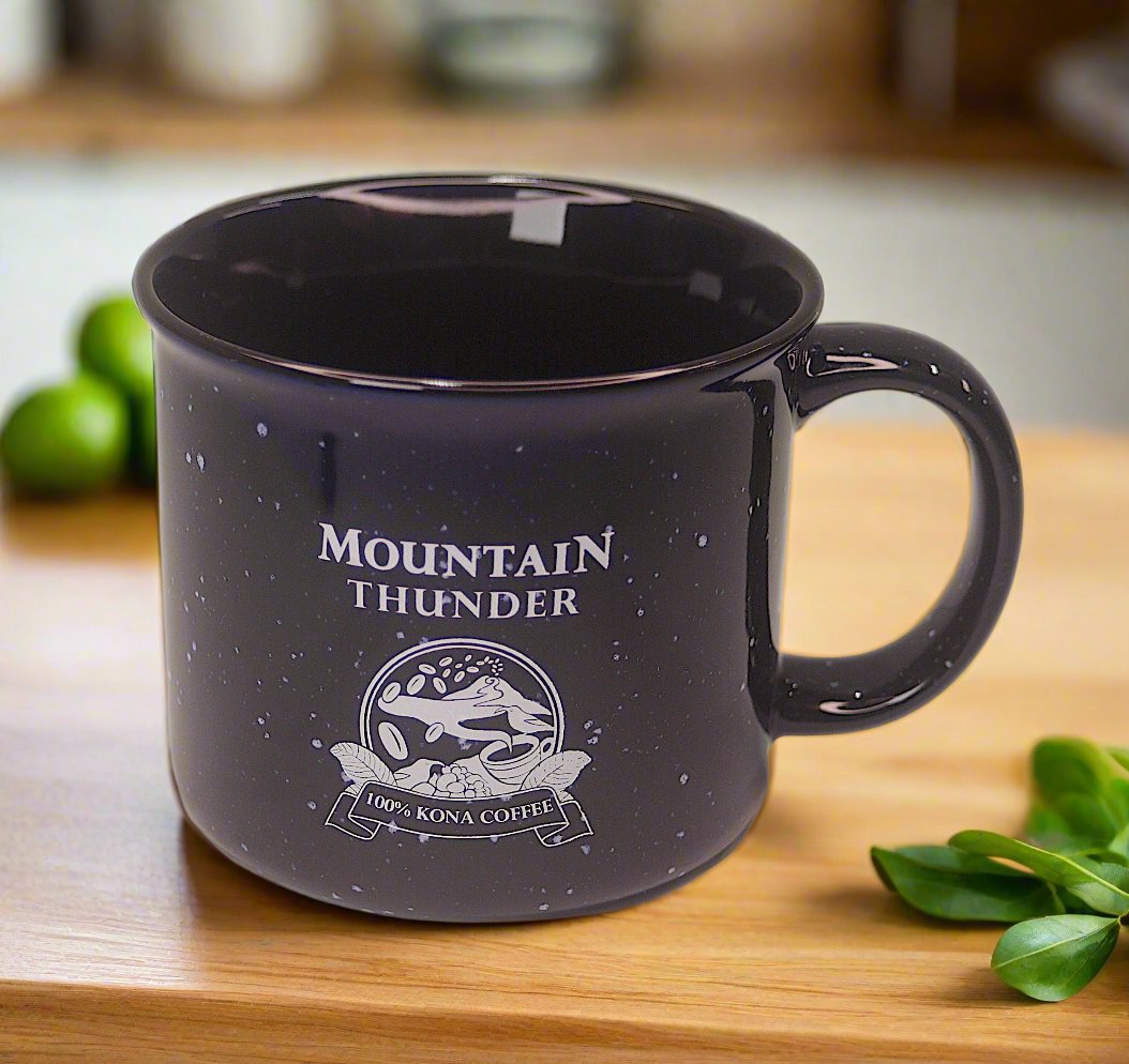 navy ceramic campfire style mug with white speckles and mountain thunder logo