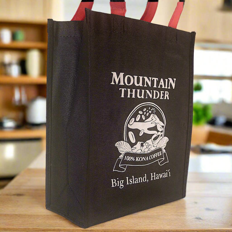 reusable tote bag with red handles and white mountain thunder logo